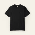 Black t-shirt with 'TPS' text mark on a neutral background